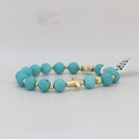 Bransoletka (KR-różaniec) / howlit syntet. nieb.